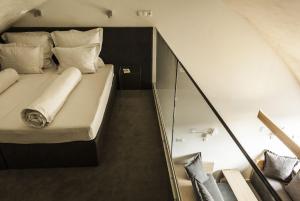 Cama ou camas em um quarto em HOT_elarnia Hotel & Spa