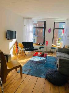 City-beach apartment nearby Amsterdam में टेलीविजन और/या मनोरंजन केंद्र