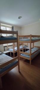 A bed or beds in a room at Hostel ALEX&TSA