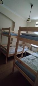 A bed or beds in a room at Hostel ALEX&TSA