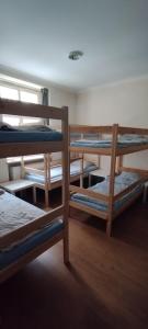 A bed or beds in a room at Hostel ALEX&TSA