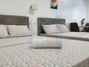 Vuode tai vuoteita majoituspaikassa RiCres Hometel Double Bed R124