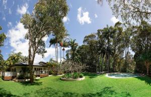 Um jardim em Sunrise Guesthouse