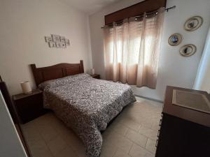 Ліжко або ліжка в номері Casa grande 3 dormitorios playa alvorada