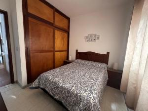 Ліжко або ліжка в номері Casa grande 3 dormitorios playa alvorada