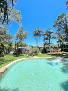 A piscina localizada em Sunrise Guesthouse ou nos arredores