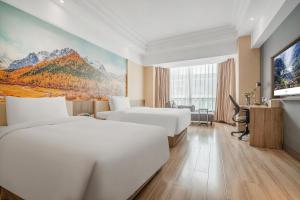 เตียงในห้องที่ Atour Hotel Chengdu Taikoo Li Riverside