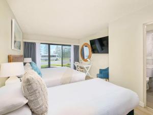 Postelja oz. postelje v sobi nastanitve ibis Styles Port Macquarie