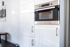 A cozinha ou cozinha compacta de Holiday Home Maridu Family L-Cube