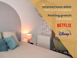 Säng eller sängar i ett rum på Les Chambres de Troyes - Parking Free Fibre Netflix