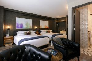 Tempat tidur dalam kamar di The Anndore House, part of JDV by Hyatt