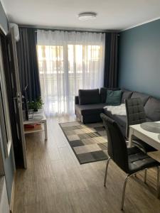 Apartament Jantar tesisinde bir oturma alanı