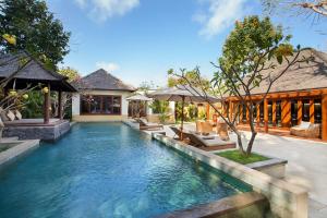 בריכת השחייה שנמצאת ב-Amarterra Villas Resort Bali Nusa Dua, Autograph Collection או באזור