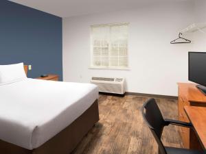 Televiisor ja/või meelelahutuskeskus majutusasutuses Extended Stay America Select Suites - Las Cruces