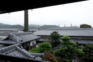 a view of roofs of buildings and trees at Kungin Bettei - Vacation STAY 14605 in Himeji