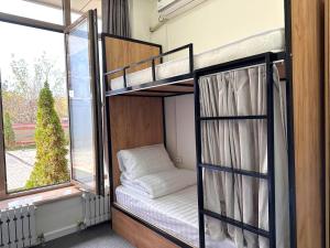 Posteľ alebo postele v izbe v ubytovaní Stay Hostel