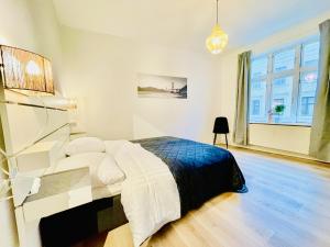 מיטה או מיטות בחדר ב-aday - Classy 2 bedrooms apartment in the center of Aalborg