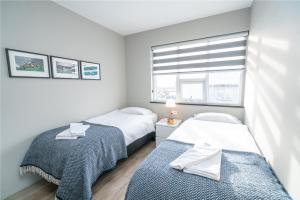 Ліжко або ліжка в номері Guesthouse Keflavik by Reykjavik Keflavik Airport