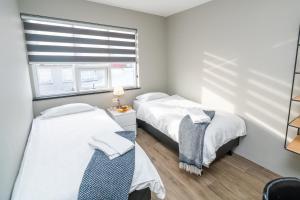 Ліжко або ліжка в номері Guesthouse Keflavik by Reykjavik Keflavik Airport