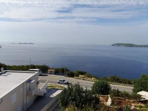 a view of the ocean from a building at Apartmani NIKA in Dubrovnik