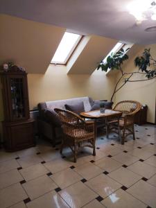 A seating area at Hotel Delfin