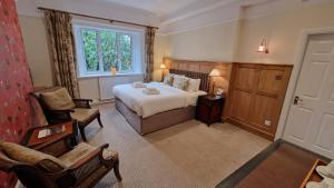 Ambleside Manor - Vegetarian B&B में एक कमरे में एक या कई बेड