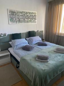 Кровать или кровати в номере Apartmán Nitra