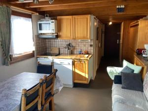 Majoituspaikan Appartement dupleix - 6 personnes - Grand Bornand village keittiö tai keittotila