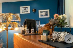 a table with items on top of it at Escale Rochelaise, chambre avec acces toute l'année au sauna et SPA chauffée in La Rochelle