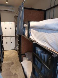 Cama ou camas em um quarto em 薇薇青旅-嚞驫驛站