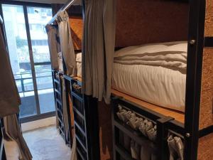 Cama ou camas em um quarto em 薇薇青旅-嚞驫驛站