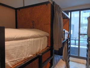 Cama ou camas em um quarto em 薇薇青旅-嚞驫驛站