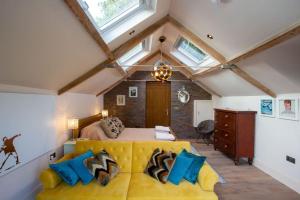 A bed or beds in a room at The Tullet, boutique hideaway in Somerset