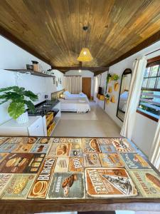 A bed or beds in a room at Villa Tiê Paraty