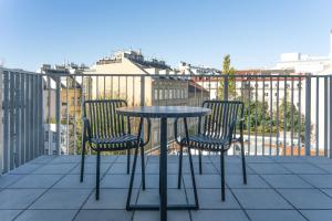 A balcony or terrace at Numa I Terra Apartments