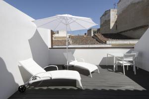 A balcony or terrace at Hostal Emeritae