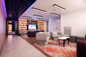 A seating area at YOTEL Porto