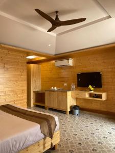 A television and/or entertainment centre at Grace Exotica Goa