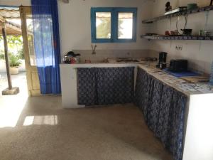 Dapur atau dapur kecil di Campement Mussuwam