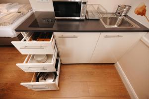 Una cocina o kitchenette en KH Apartments Universitaet