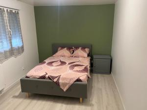 Voodi või voodid majutusasutuse Sublime appartement T3 toas