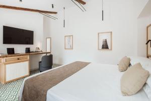 Gulta vai gultas numurā naktsmītnē SorrentoVibes - Boutique Suites 186