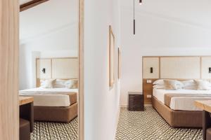 Gulta vai gultas numurā naktsmītnē SorrentoVibes - Boutique Suites 186