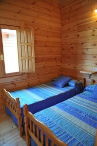 Cama ou camas em um quarto em Bungalows Sol e Mar