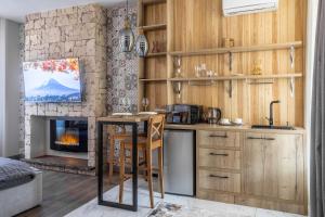 Una cocina o kitchenette en Apart Hotel Colibri