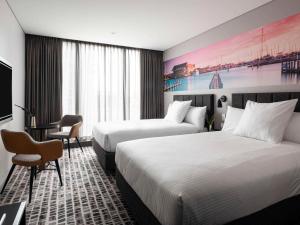 Кровать или кровати в номере Novotel Perth Murray Street