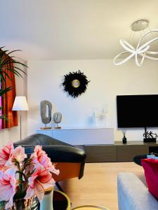 Televisor o centre d'entreteniment de Urbanstay Suites Grand Place Luxury Apartment