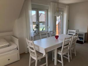 Et opholdsområde på NEU Ferienwohnung Victorbur