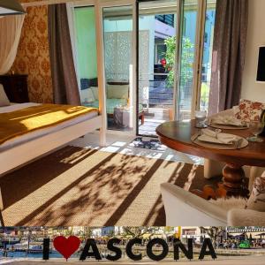 Giường trong phòng chung tại Traumhaftes Appartment in Ascona nur 200m vom Lago Maggiore entfernt