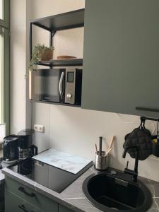 A kitchen or kitchenette at Strassi 1